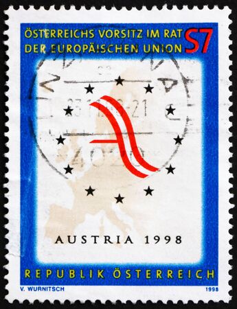 AUSTRIA - CIRCA 1998: a stamp printed in the Austria shows Map of Europe and Austrian Flag, Austrian Presidency of the European Union, circa 1998のeditorial素材