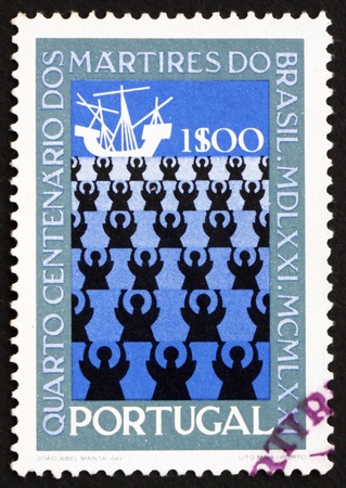 PORTUGAL - CIRCA 1971: a stamp printed in the Portugal shows Missionaries and Ship, 400th Anniversary of the Martyrdom of a Group of Portuguese Missionaries, circa 1971のeditorial素材