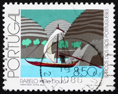 PORTUGAL - CIRCA 1981: a stamp printed in the Portugal shows Rabelo, Douro River, circa 1981のeditorial素材