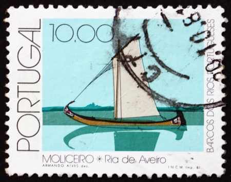 PORTUGAL - CIRCA 1981: a stamp printed in the Portugal shows Moliceiro, Aveiro River, circa 1981のeditorial素材