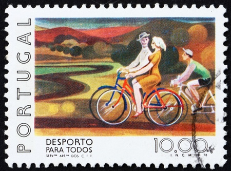 PORTUGAL - CIRCA 1978: a stamp printed in the Portugal shows Bicycling, Sport for all the People, circa 1978のeditorial素材