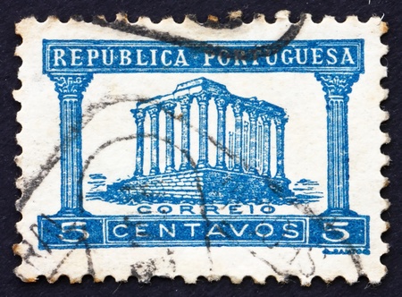 PORTUGAL - CIRCA 1935: a stamp printed in the Portugal shows Roman Temple, Evora, circa 1935のeditorial素材