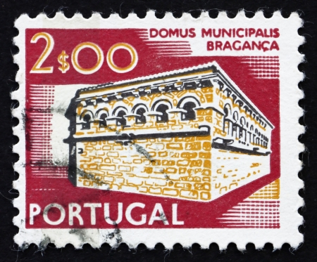 PORTUGAL - CIRCA 1974: a stamp printed in the Portugal shows City Hall, Braganca, circa 1974のeditorial素材