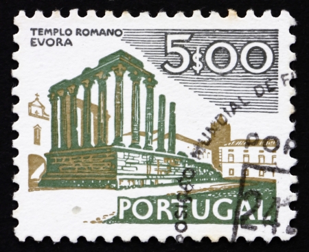 PORTUGAL - CIRCA 1974: a stamp printed in the Portugal shows Roman Temple, Evora, circa 1974のeditorial素材