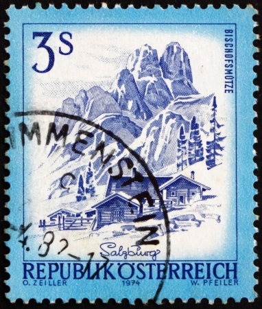 AUSTRIA - CIRCA 1974: a stamp printed in the Austria shows Bishofsmutze, Salzburg, circa 1974のeditorial素材