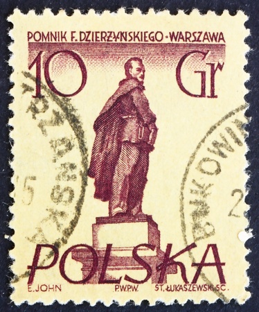 POLAND - CIRCA 1955: a stamp printed in the Poland shows Feliks E. Dzerzhinski, Warsaw Monument, Polish Revolutionary, circa 1955のeditorial素材