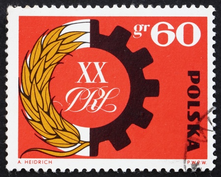 POLAND - CIRCA 1964: a stamp printed in the Poland shows Symbol of Peasant-Worker Alliance, circa 1964のeditorial素材