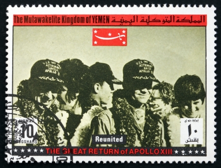 YEMEN - CIRCA 1969: a stamp printed in the Yemen shows Reunited, Return of Apollo XIII, circa 1969のeditorial素材