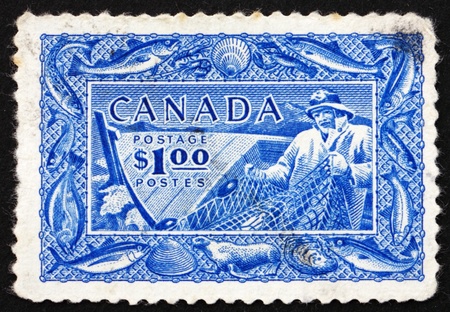 CANADA - CIRCA 1951: a stamp printed in the Canada shows Fishing, Fish Resources, circa 1951のeditorial素材