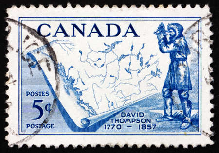 CANADA - CIRCA 1957: a stamp printed in the Canada shows David Thompson and Map of Western Canada, Explorer and Geographer, circa 1957のeditorial素材