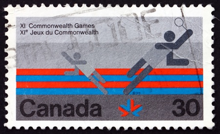 CANADA - CIRCA 1978: a stamp printed in the Canada shows Badminton, 11th Commonwealth Games, Edmonton, circa 1978のeditorial素材