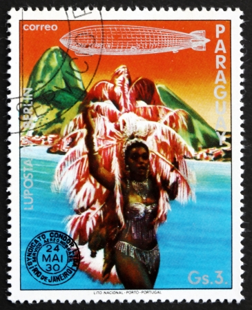 PARAGUAY - CIRCA 1977: a stamp printed in Paraguay shows Dancer, Rio de Janeiro, Brazil, Graf Zeppelin 1st South America Flight, circa 1977のeditorial素材