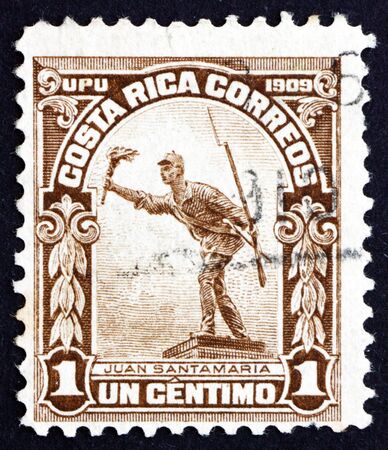 COSTA RICA - CIRCA 1910: a stamp printed in Costa Rica shows Statue of Juan Santamaria, National Hero of the Republic of Costa Rica, circa 1910のeditorial素材
