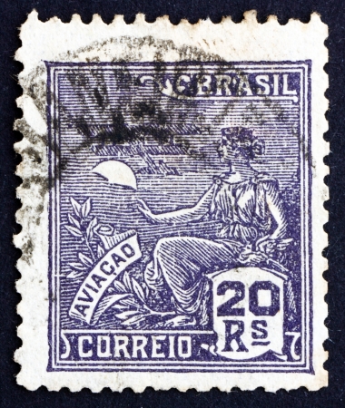 BRAZIL - CIRCA 1929: a stamp printed in the Brazil shows Allegory of Aviation, circa 1929のeditorial素材