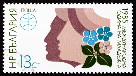 BULGARIA - CIRCA 1985: a stamp printed in the Bulgaria shows International Youth Year, circa 1985のeditorial素材