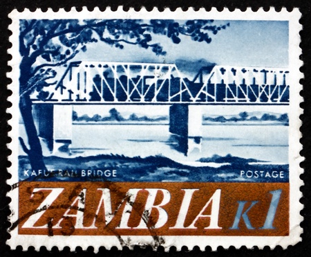 ZAMBIA - CIRCA 1968: a stamp printed in the Zambia shows Railroad Bridge, Kafue River, circa 1968のeditorial素材