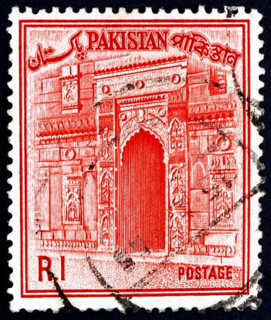 PAKISTAN - CIRCA 1963: a stamp printed in Pakistan shows Gate of Choto Shona Masjid Mosque, Small Golden Mosque, Bangladesh, circa 1963のeditorial素材