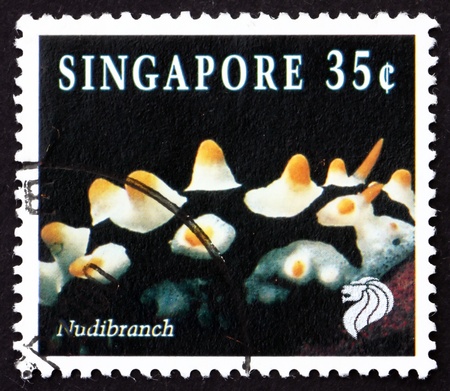 SINGAPORE - CIRCA 1994: a stamp printed in the Singapore shows Nudibranch, Marine Gastropod Mollusk, circa 1994のeditorial素材