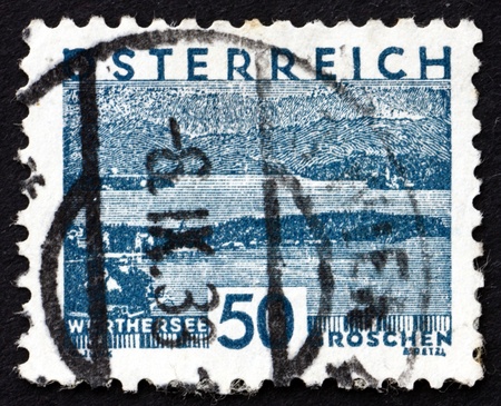 AUSTRIA - CIRCA 1930: a stamp printed in the Austria shows View of Worthersee, circa 1930のeditorial素材