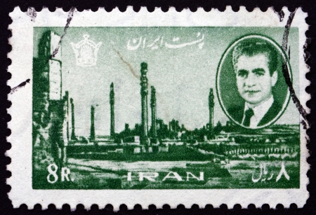 IRAN - CIRCA 1966: a stamp printed in the Iran shows Mohammad Reza Shah Pahlavi, Shah of Persia and Ruins of Persepolis, circa 1966のeditorial素材