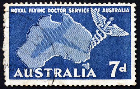 AUSTRALIA - CIRCA 1957: a stamp printed in the Australia shows Caduceus and Map of Australia, Royal...