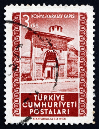 TURKEY - CIRCA 1952: a stamp printed in the Turkey shows Karatay Gate, Konya, circa 1952のeditorial素材