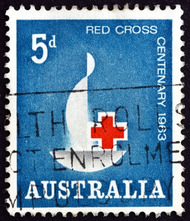 AUSTRALIA - CIRCA 1963: a stamp printed in the Australia shows Red Cross Centenary Emblem, Centenary of the International Red Cross, circa 1963のeditorial素材
