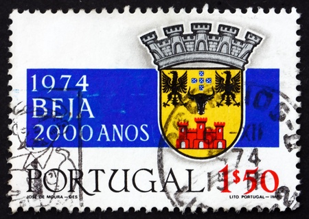 PORTUGAL - CIRCA 1972: a stamp printed in the Portugal shows Coat of Arms of Beja, 2000th Anniversary of City of Beja, circa 1972のeditorial素材