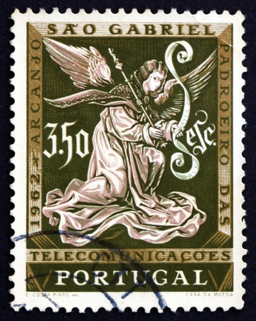 PORTUGAL - CIRCA 1962: a stamp printed in the Portugal shows Archangel Gabriel, Messenger, St. Gabriels Day, Patron of Telecommunications, circa 1962のeditorial素材