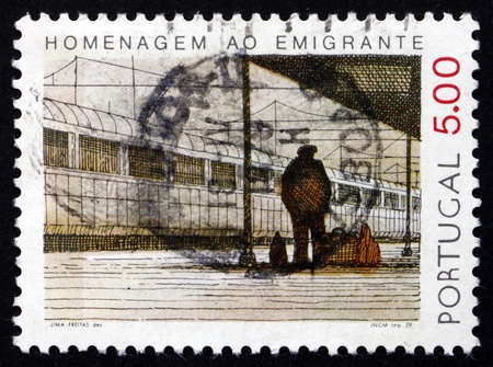 PORTUGAL - CIRCA 1979: a stamp printed in the Portugal shows Emigrant at Railroad Station, circa 1979のeditorial素材