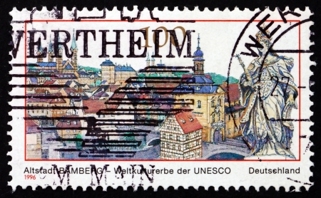 GERMANY - CIRCA 1996: a stamp printed in the Germany shows View of Bamberg, Old Town, Town in Bavaria, UNESCO World Cultural Heritage, circa 1996のeditorial素材