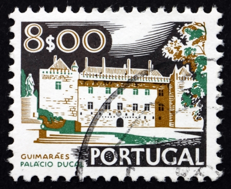 PORTUGAL - CIRCA 1973: a stamp printed in the Portugal shows Ducal Palace, Guimaraes, Historical Building, circa 1973のeditorial素材