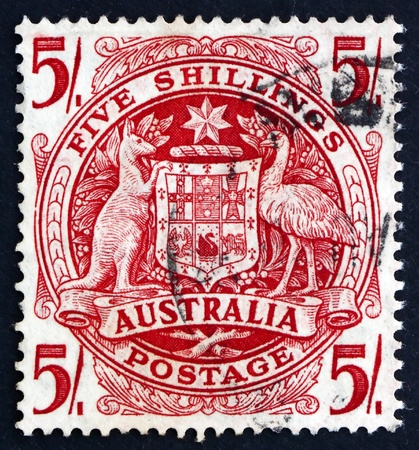 AUSTRALIA - CIRCA 1953: a stamp printed in the Australia shows Arms of Australia, circa 1953のeditorial素材