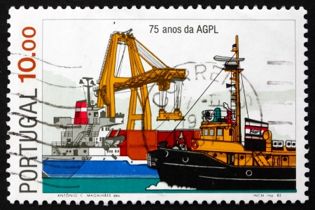 PORTUGAL - CIRCA 1983: a stamp printed in the Portugal shows Ships, 75th Anniversary of Port Authority of Lisbon, circa 1983のeditorial素材