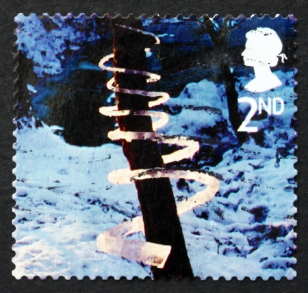 GREAT BRITAIN - CIRCA 2003: a stamp printed in the Great Britain shows Ice Spiral, Ice Sculpture by Andy Goldsworthy, Christmas, circa 2003のeditorial素材