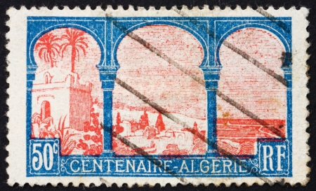 ALGERIA - CIRCA 1926: a stamp printed in Algeria shows Marabout of Sidi Yacoub, circa 1926のeditorial素材