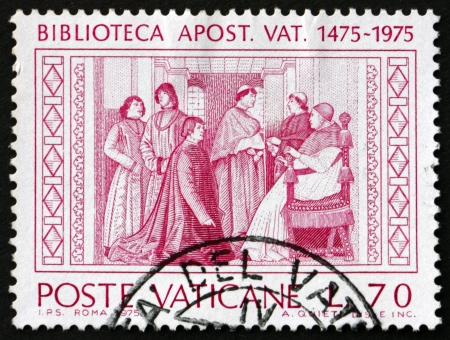 VATICAN - CIRCA 1975: a stamp printed in the Vatican shows Investiture of First Librarian Bartolomeo Sacchi by Pope Sixtus IV, 500th Anniversary of Founding of the Vatican Apostolic Library, circa 1975のeditorial素材