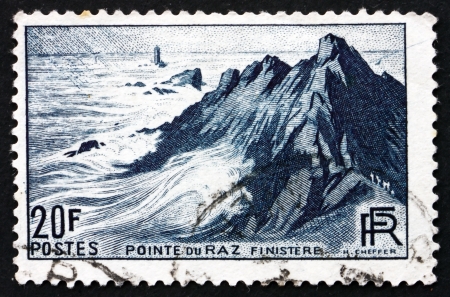 FRANCE - CIRCA 1946: a stamp printed in the France shows View of Pointe du Raz, Finistere, Peninsula in France, Popular Tourist Destination, circa 1946のeditorial素材