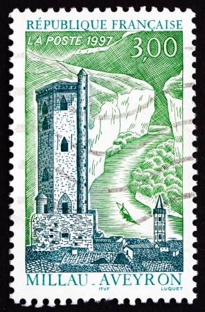 FRANCE - CIRCA 1997: a stamp printed in the France shows Belfry Tower, French Heritage Monument, Millau, Commune in the Aveyron Department, circa 1997のeditorial素材