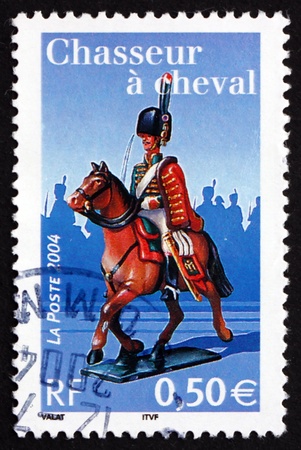 FRANCE - CIRCA 2004: a stamp printed in the France shows Light Cavalry, Napoleon I and the Imperial Guard, circa 2004のeditorial素材