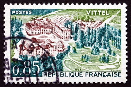 CIRCA 1963: a stamp printed in the France shows Therme Vittel, Vosges, Lorraine, circa 1963のeditorial素材