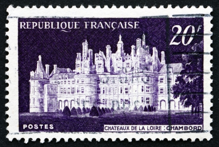 FRANCE - CIRCA 1952: a stamp printed in the France shows View of Chateau de Chambord, Loir-et-Cher, circa 1952のeditorial素材