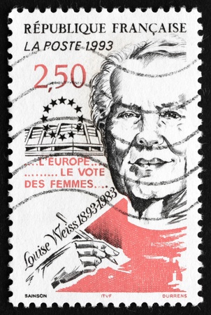 FRANCE - CIRCA 1993: a stamp printed in the France shows Louise Weiss, Suffragist, Author, Journalist, Feminist and European Politician, circa 1993のeditorial素材