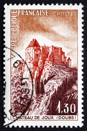 FRANCE - CIRCA 1965: a stamp printed in the France shows View of Joux Chateau, Doubs, Jura Mountains, circa 1965のeditorial素材