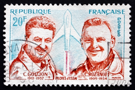 FRANCE - CIRCA 1959: a stamp printed in the France shows Charles Goujon and Col. Constantin Rozanoff, Test Pilots, circa 1959のeditorial素材