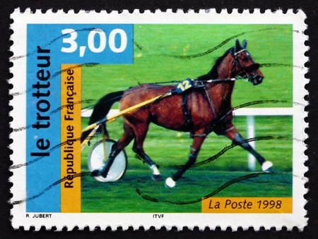 FRANCE - CIRCA 1998: a stamp printed in the France shows French Trotter, Horse, Race Horse, circa 1998のeditorial素材