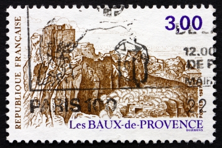 FRANCE - CIRCA 1987: a stamp printed in the France shows View of Les Baux, Provence, circa 1987のeditorial素材