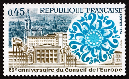 FRANCE - CIRCA 1974: a stamp printed in the France shows Council Building, View of Strasbourg and Emblem, 25th Anniversary of the Council of Europe, circa 1974のeditorial素材