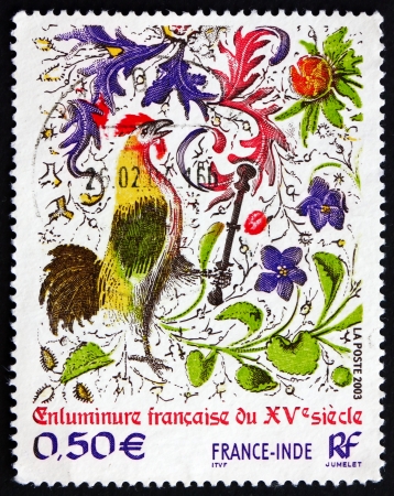 FRANCE - CIRCA 2003: a stamp printed in the France shows Rooster, France, 15th Century, Indian and French Artisans Work, circa 2003のeditorial素材