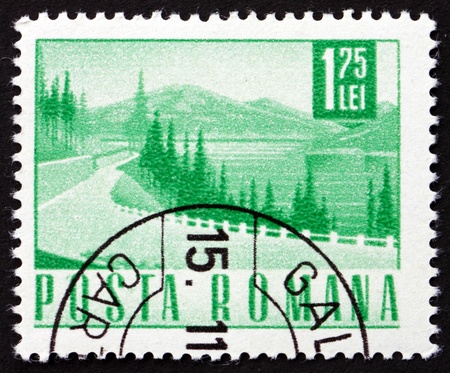 ROMANIA - CIRCA 1968: a stamp printed in the Romania shows Highway, circa 1968のeditorial素材